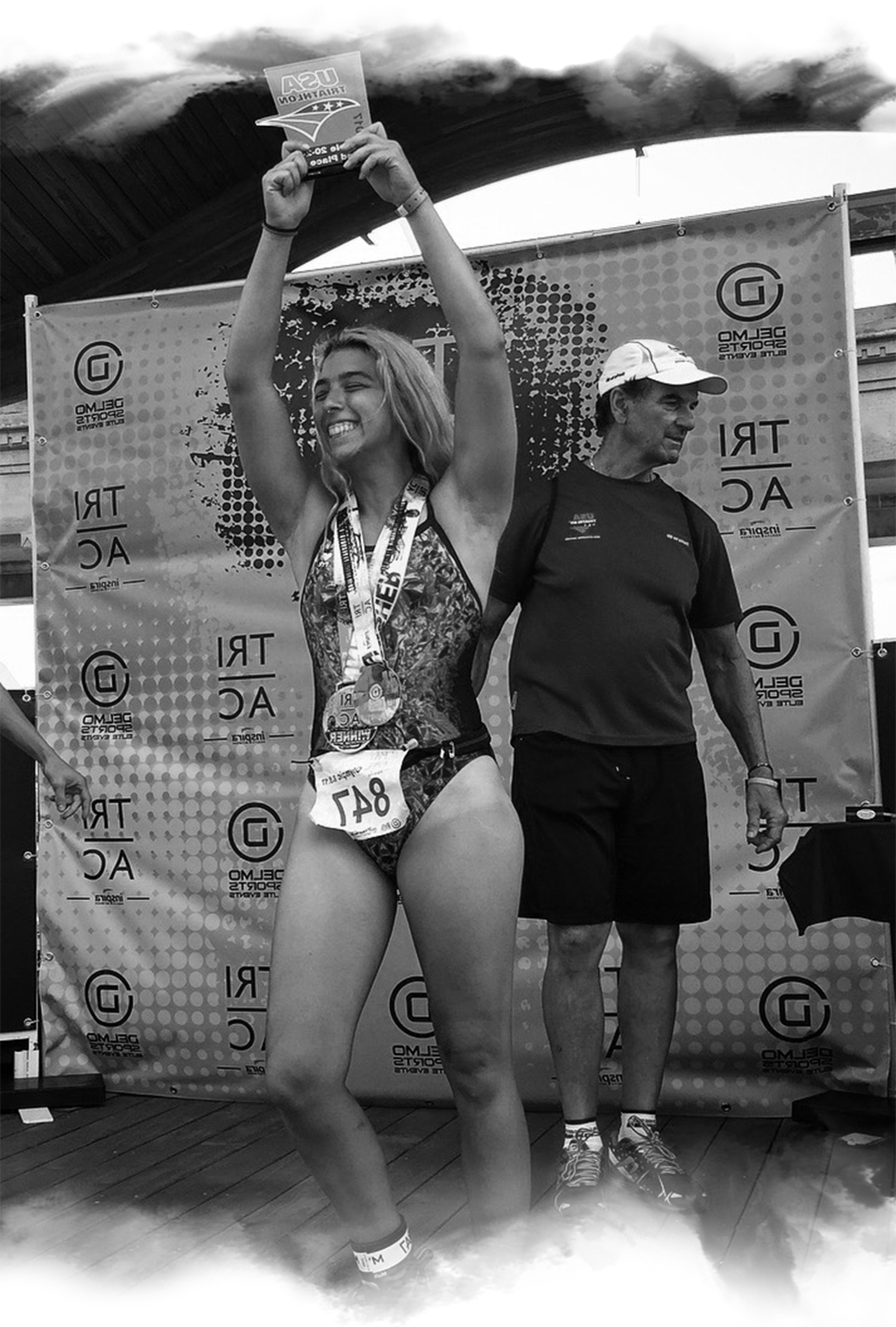 a woman holding a trophy