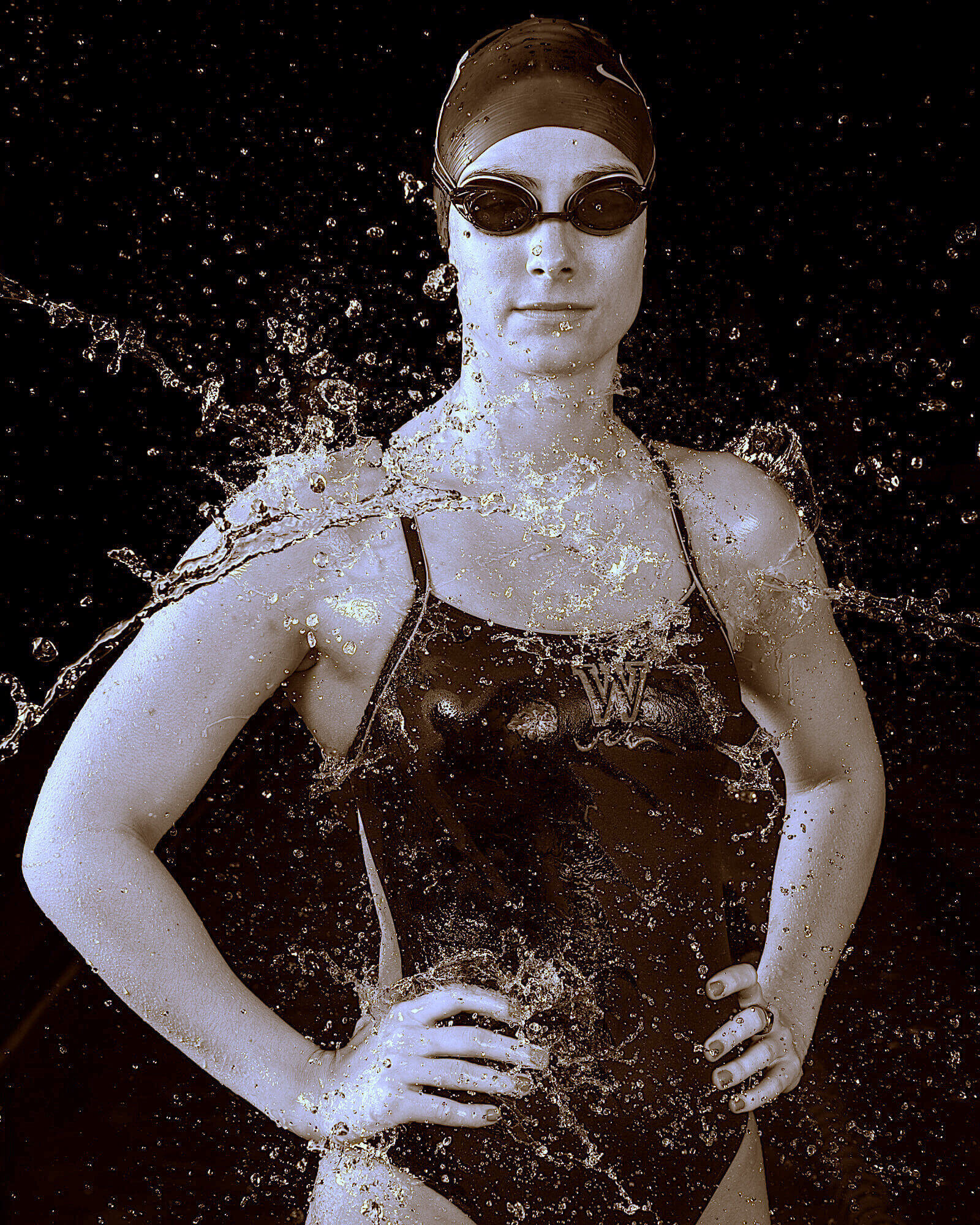 a person in a swimsuit and goggles